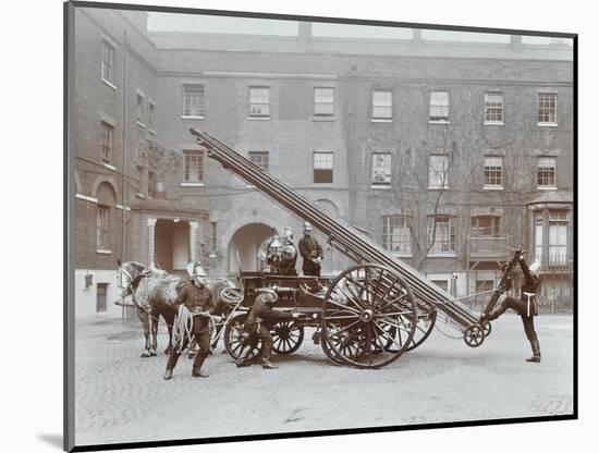 Firemen Demonstrating a Horse-Drawm Escape Vehicle, London Fire Brigade Headquarters, London, 1910-null-Mounted Photographic Print