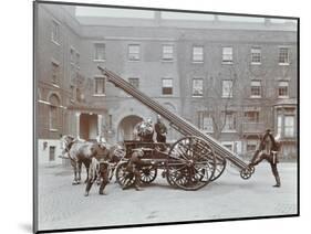 Firemen Demonstrating a Horse-Drawm Escape Vehicle, London Fire Brigade Headquarters, London, 1910-null-Mounted Photographic Print