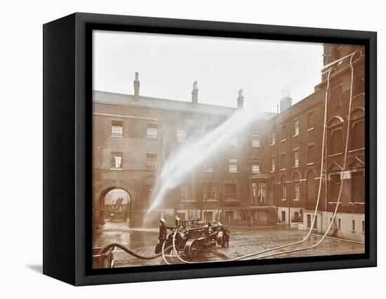 Firemen Demonstrating Hoses Worked by a Petrol Motor Pump, London Fire Brigade Headquarters, 1909-null-Framed Stretched Canvas