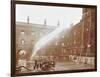 Firemen Demonstrating Hoses Worked by a Petrol Motor Pump, London Fire Brigade Headquarters, 1909-null-Framed Photographic Print