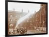 Firemen Demonstrating Hoses Worked by a Petrol Motor Pump, London Fire Brigade Headquarters, 1909-null-Framed Photographic Print