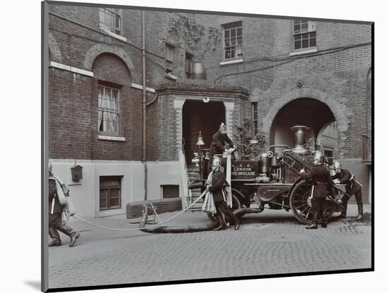 Firemen Demonstrating Motor Steamer Hoses, London Fire Brigade Headquarters, London, 1910-null-Mounted Photographic Print
