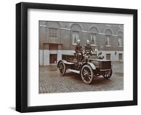 Firemen in Brass Helmets Aboard a Motor Hose Tender, London Fire Brigade Headquarters, London, 1909-null-Framed Photographic Print