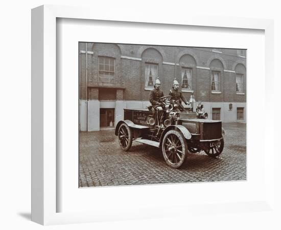 Firemen in Brass Helmets Aboard a Motor Hose Tender, London Fire Brigade Headquarters, London, 1909-null-Framed Photographic Print