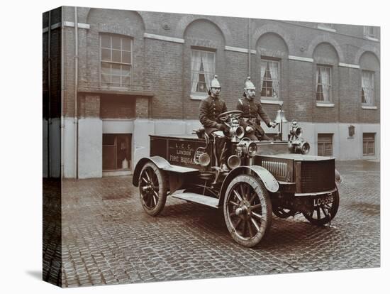 Firemen in Brass Helmets Aboard a Motor Hose Tender, London Fire Brigade Headquarters, London, 1909-null-Stretched Canvas