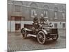 Firemen in Brass Helmets Aboard a Motor Hose Tender, London Fire Brigade Headquarters, London, 1909-null-Mounted Photographic Print