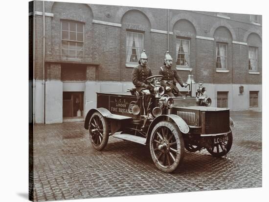 Firemen in Brass Helmets Aboard a Motor Hose Tender, London Fire Brigade Headquarters, London, 1909-null-Stretched Canvas