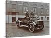 Firemen in Brass Helmets Aboard a Motor Hose Tender, London Fire Brigade Headquarters, London, 1909-null-Stretched Canvas