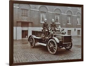 Firemen in Brass Helmets Aboard a Motor Hose Tender, London Fire Brigade Headquarters, London, 1909-null-Framed Photographic Print