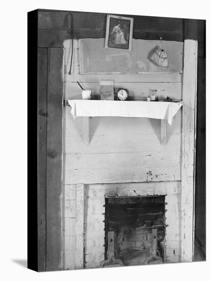 Fireplace in the bedroom of Floyd Burroughs' cabin in Hale County, Alabama, c.1936-Walker Evans-Stretched Canvas