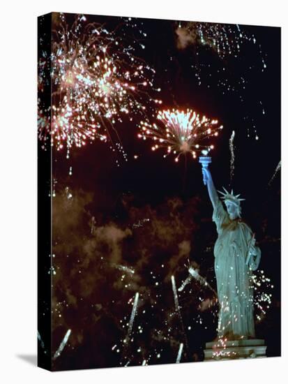Fireworks Explode Around the Statue of Liberty-null-Stretched Canvas