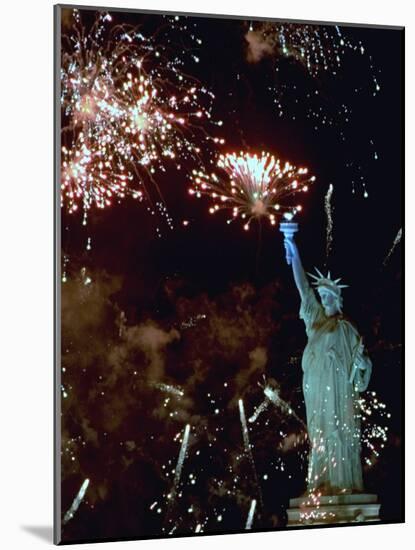 Fireworks Explode Around the Statue of Liberty-null-Mounted Photographic Print
