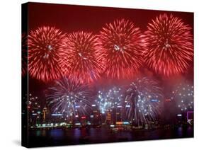 Fireworks Explode Over Hong Kong's Victoria Harbor-null-Stretched Canvas