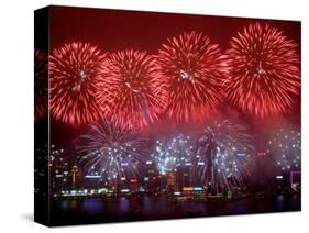 Fireworks Explode Over Hong Kong's Victoria Harbor-null-Stretched Canvas