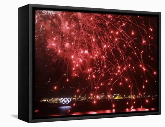 Fireworks Explode over the Olympic Rings During the Opening Ceremony of the Vancouver 2010 Olympics-null-Framed Stretched Canvas