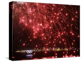 Fireworks Explode over the Olympic Rings During the Opening Ceremony of the Vancouver 2010 Olympics-null-Stretched Canvas