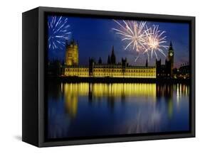 Fireworks exploding over the Houses of Parliament and the river Thames, London, England-null-Framed Stretched Canvas