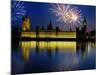 Fireworks exploding over the Houses of Parliament and the river Thames, London, England-null-Mounted Photographic Print