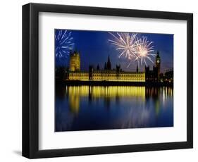Fireworks exploding over the Houses of Parliament and the river Thames, London, England-null-Framed Photographic Print
