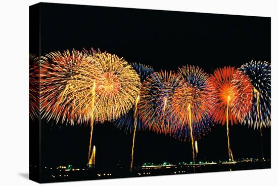 Fireworks in a Row at Night-null-Stretched Canvas