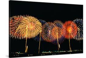 Fireworks in a Row at Night-null-Stretched Canvas