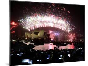 Fireworks That Flash Above Sydney Harbour Bridge and Opera House During New Year Celebrations-null-Mounted Photographic Print