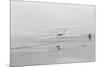 First flight, Kitty Hawk, North Carolina, 120 feet in 12 seconds, 10.35am December 17th 1903-John T. Daniels-Mounted Giclee Print