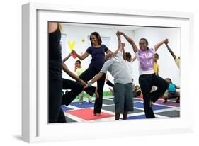 First Lady Michelle Obama Joins an after School 'Let's Move!' Yoga Class after School Activities-null-Framed Photo