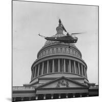 First Successful Us Army Helicopter Designed by Igor Sikorsky Flying Past the Capitol Dome-J^ R^ Eyerman-Mounted Photographic Print