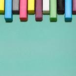 Creative Still Life of Multicolored Chalks Arranged in a Row Like Piano Keys-Fisher Photostudio-Framed Art Print