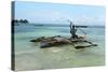 Fisherman and Traditional Outrigger Boat-Peter Richardson-Stretched Canvas
