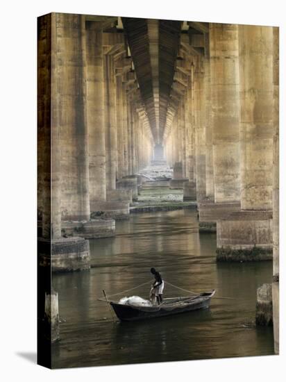 Fisherman Casts His Net in the River Ganges on the Outskirts of Allahabad, India-null-Stretched Canvas