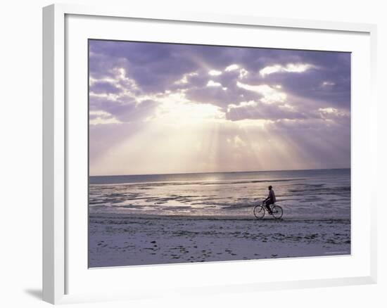 Fisherman Cycling Along the Beach Near Bweju Against Dramatic Sky, Island of Zanzibar, Tanzania-Lee Frost-Framed Photographic Print