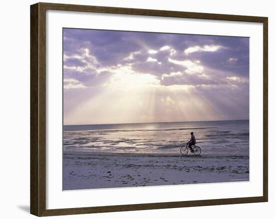 Fisherman Cycling Along the Beach Near Bweju Against Dramatic Sky, Island of Zanzibar, Tanzania-Lee Frost-Framed Photographic Print