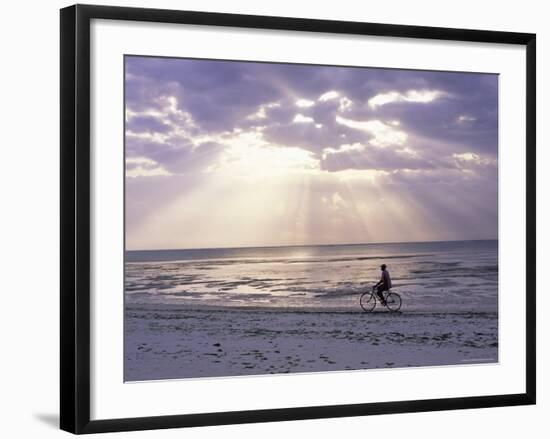 Fisherman Cycling Along the Beach Near Bweju Against Dramatic Sky, Island of Zanzibar, Tanzania-Lee Frost-Framed Photographic Print