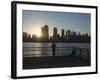 Fisherman Fishing from a Jersey City Pier at Dawn Facing the Manhattan Skyline, Jersey City-Amanda Hall-Framed Photographic Print