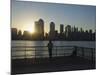 Fisherman Fishing from a Jersey City Pier at Dawn Facing the Manhattan Skyline, Jersey City-Amanda Hall-Mounted Photographic Print