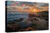 Fisherman fishing off rocks at sunrise, Queensland, Australia-Mark A Johnson-Stretched Canvas