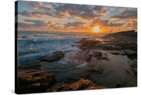 Fisherman fishing off rocks at sunrise, Queensland, Australia-Mark A Johnson-Stretched Canvas