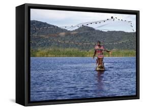 Fisherman in Dugout Canoe Casts Net in Shire River, Lake Malawi's Only Outlet, Southern End of Lake-Nigel Pavitt-Framed Stretched Canvas