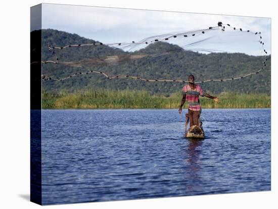 Fisherman in Dugout Canoe Casts Net in Shire River, Lake Malawi's Only Outlet, Southern End of Lake-Nigel Pavitt-Stretched Canvas