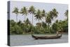 Fisherman in Traditional Boat on the Kerala Backwaters, Kerala, India, Asia-Martin Child-Stretched Canvas