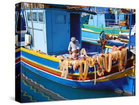 Fisherman Knotting a Fishing Net, Marsaxlokk, Malta, Mediterranean, Europe-Sakis Papadopoulos-Stretched Canvas