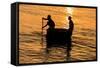 Fisherman Landing the Night Catch. Vietnam, Indochina-Tom Norring-Framed Stretched Canvas