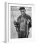 Fisherman Lauri Rapala, Who Handmakes Fishing Lures, with a Fish He Caught-null-Framed Photographic Print