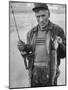 Fisherman Lauri Rapala, Who Handmakes Fishing Lures, with a Fish He Caught-null-Mounted Photographic Print