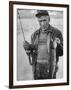 Fisherman Lauri Rapala, Who Handmakes Fishing Lures, with a Fish He Caught-null-Framed Photographic Print