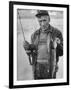 Fisherman Lauri Rapala, Who Handmakes Fishing Lures, with a Fish He Caught-null-Framed Photographic Print