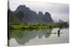 Fisherman on bamboo raft on Mingshi River at sunset, Mingshi, Guangxi Province, China-Keren Su-Stretched Canvas