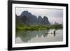Fisherman on bamboo raft on Mingshi River at sunset, Mingshi, Guangxi Province, China-Keren Su-Framed Photographic Print